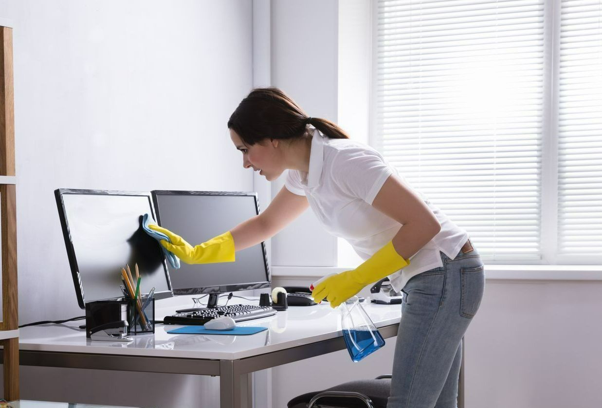 Woman Wiping Handrail — Falmouth, MA — Efficient Housekeeping