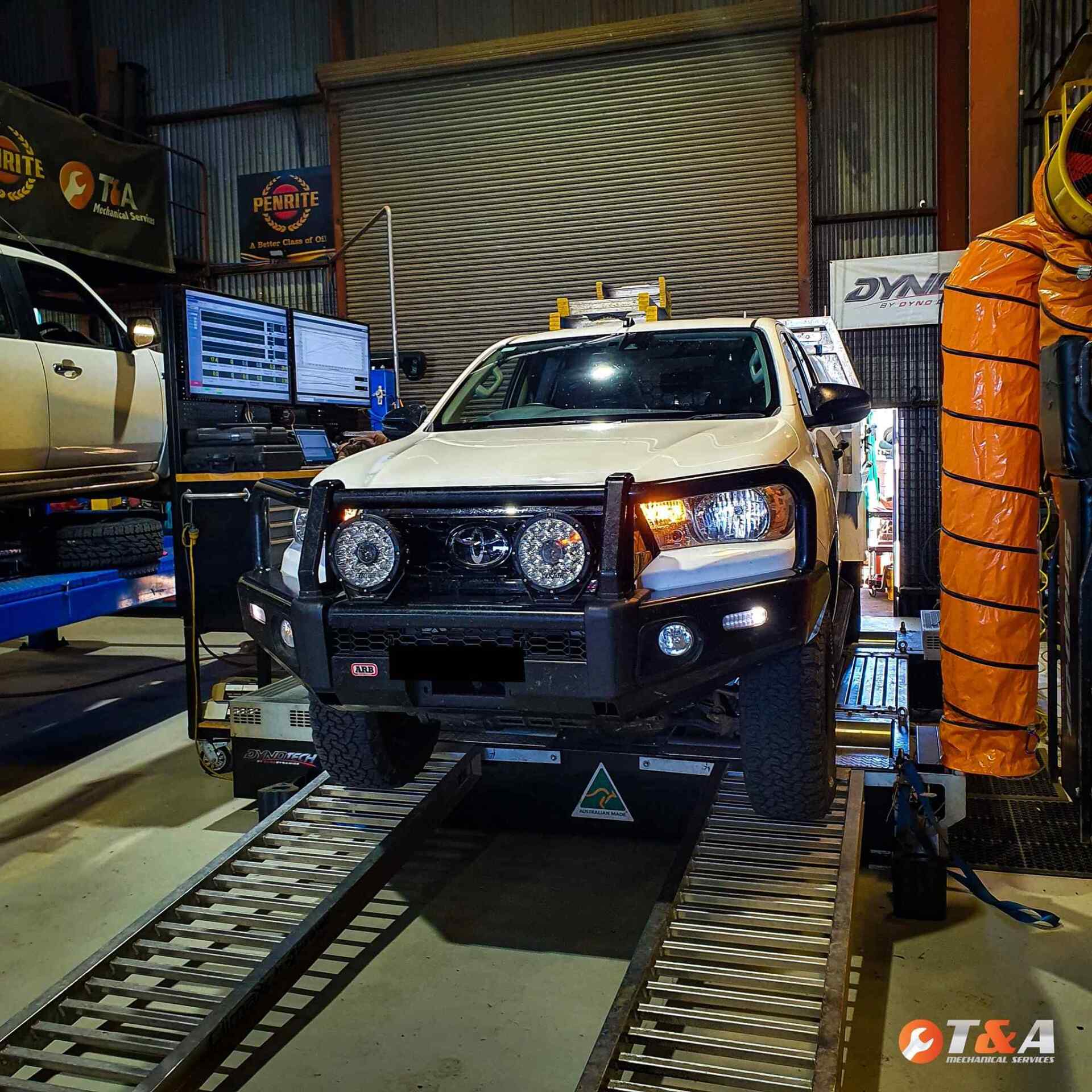 Pick Up Truck Under Go in Tanda Tuning — Dyno Tuning in Dubbo, NSW