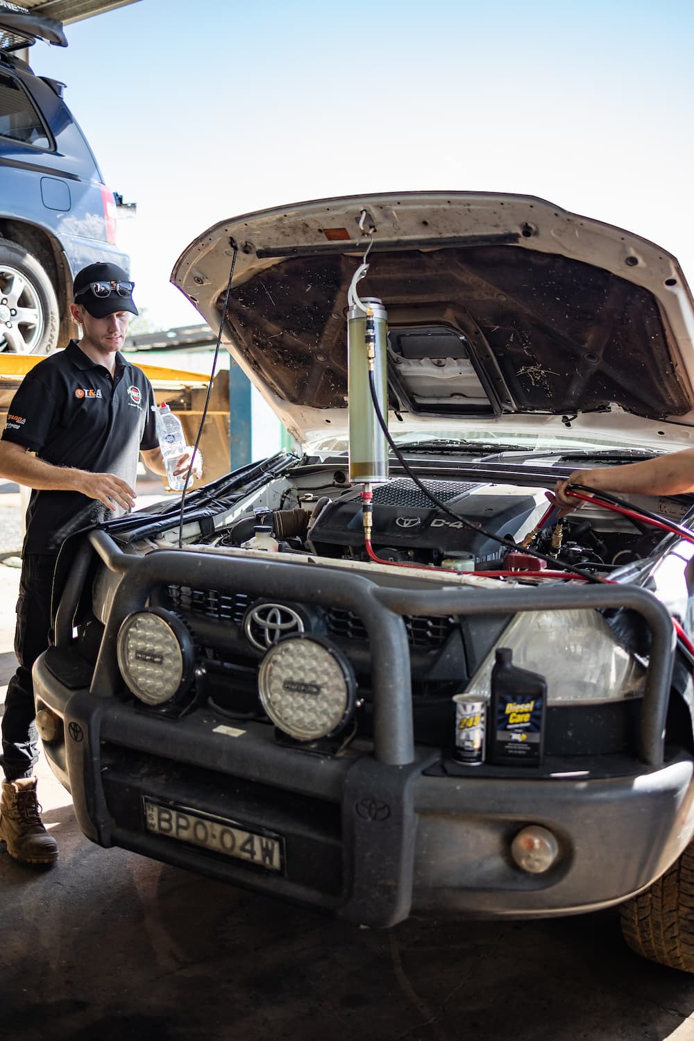 Man Inspecting the Car Engine — Dyno Tuning in Dubbo, NSW