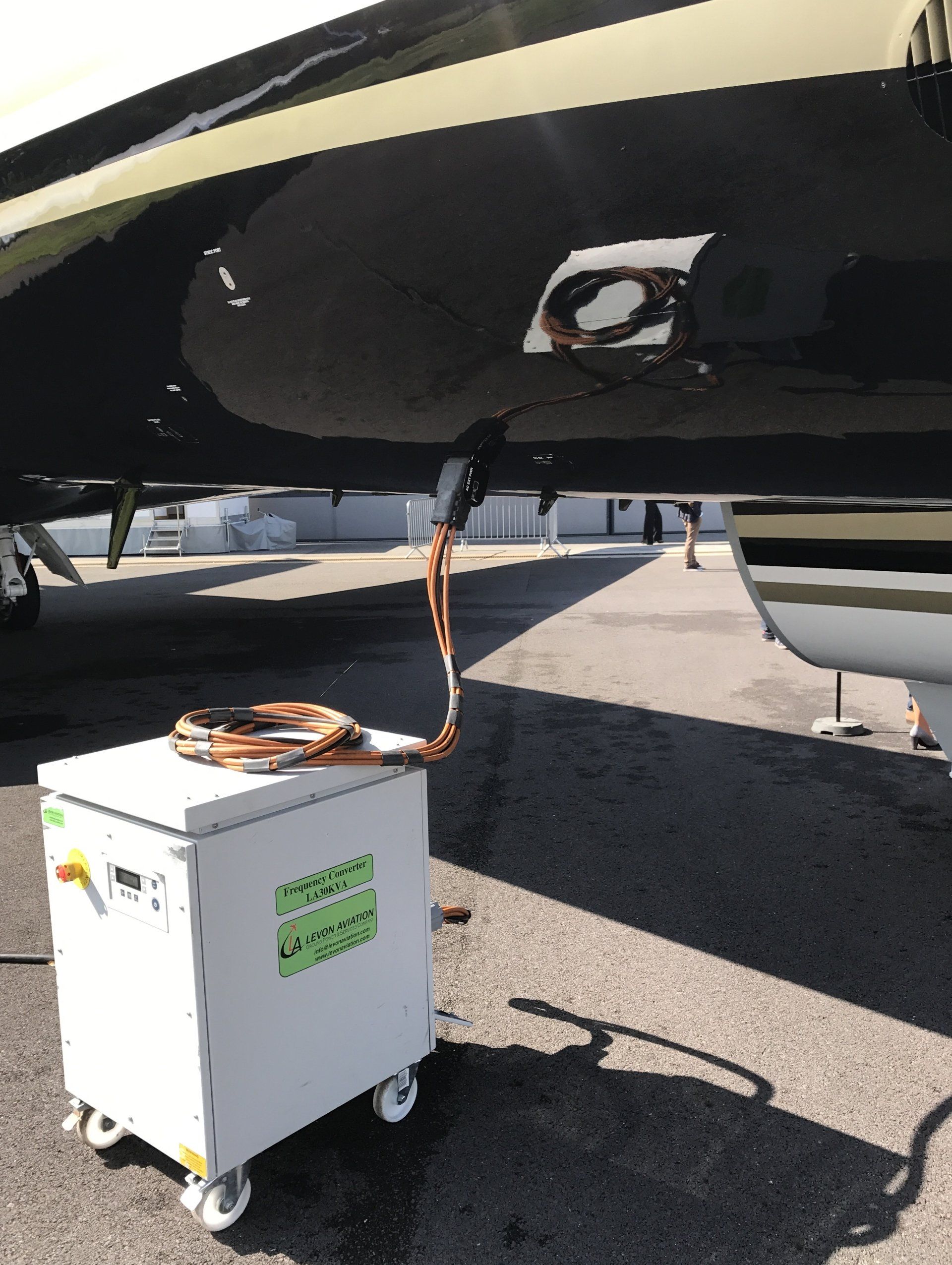 Levon Aviation frequency converter plugged into airplane