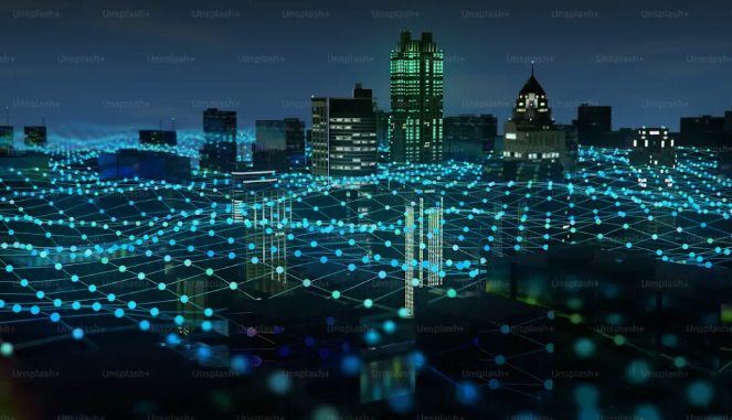 A city skyline at night overlaid with a glowing blue digital data grid connecting the buildings.