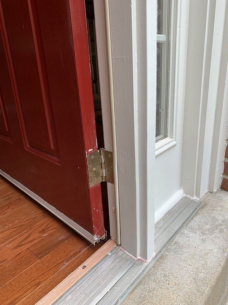 Chocolate Brown Door and white door frame — Foristell, MO — Master of Repair Services, LLC