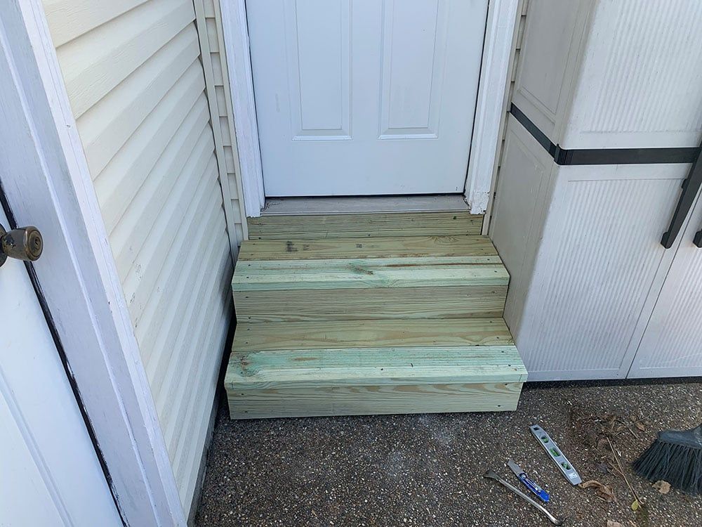 Door with new steps — Foristell, MO — Master of Repair Services, LLC