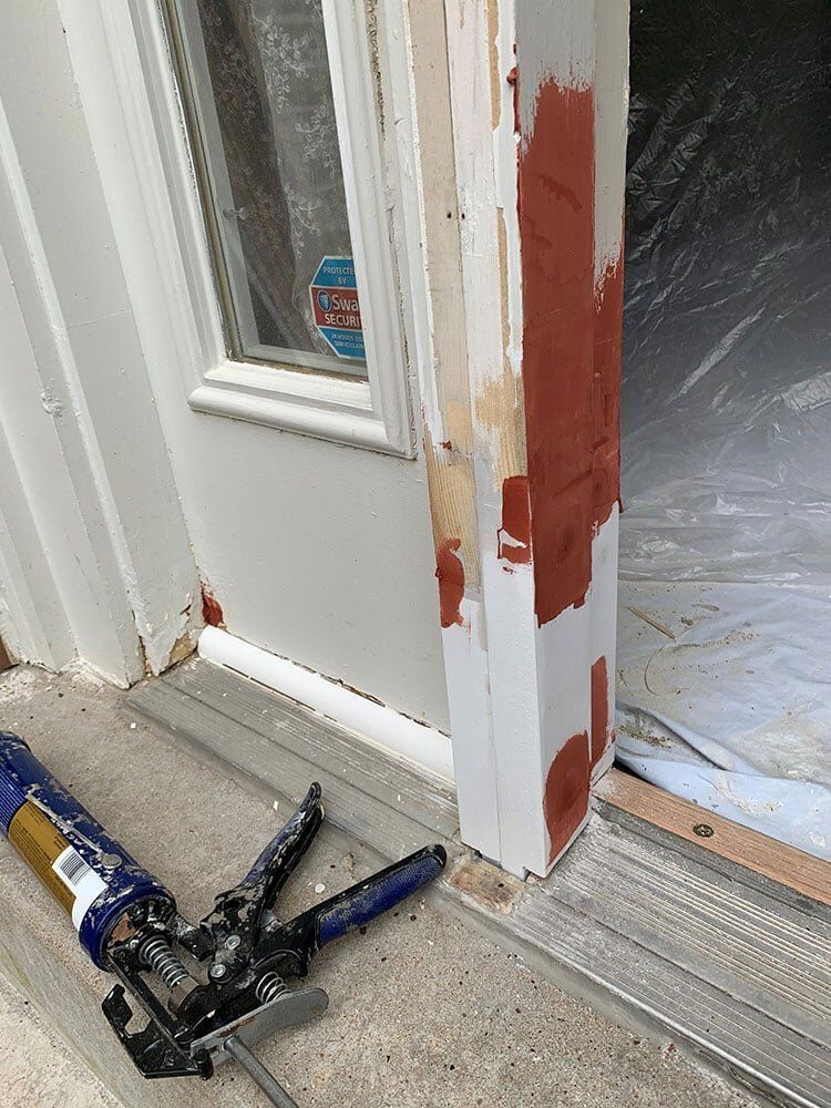 Door frame with damage — Foristell, MO — Master of Repair Services, LLC