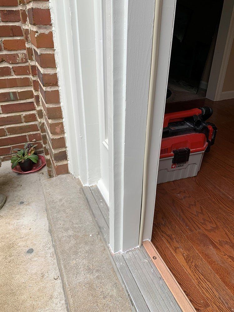 White Door frame and vinyl floor — Foristell, MO — Master of Repair Services, LLC