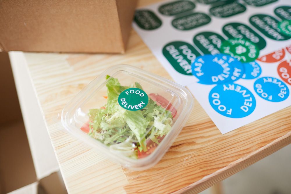 Fresh Salad In Plastic Packaging With Sticker — Graphic Designer In Airlie Beach, QLD