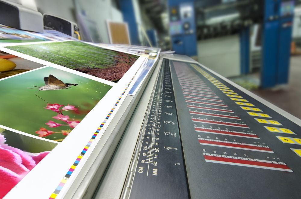 Close Up View Of Printed Layout On The Machine — Graphic Designer In Bowen, QLD