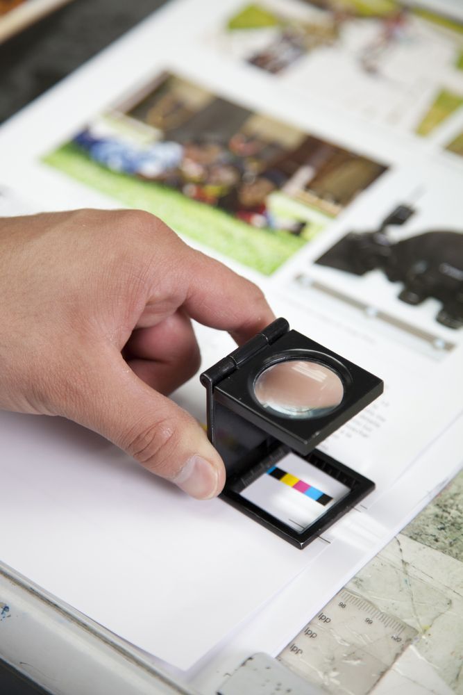 Magnifying Glass With Color Samples Scale — Graphic Designer In Moranbah, QLD