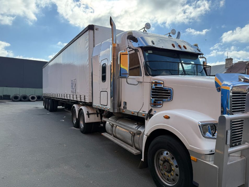 A white truck is parked — Goulburn Transport In Goulburn, NSW