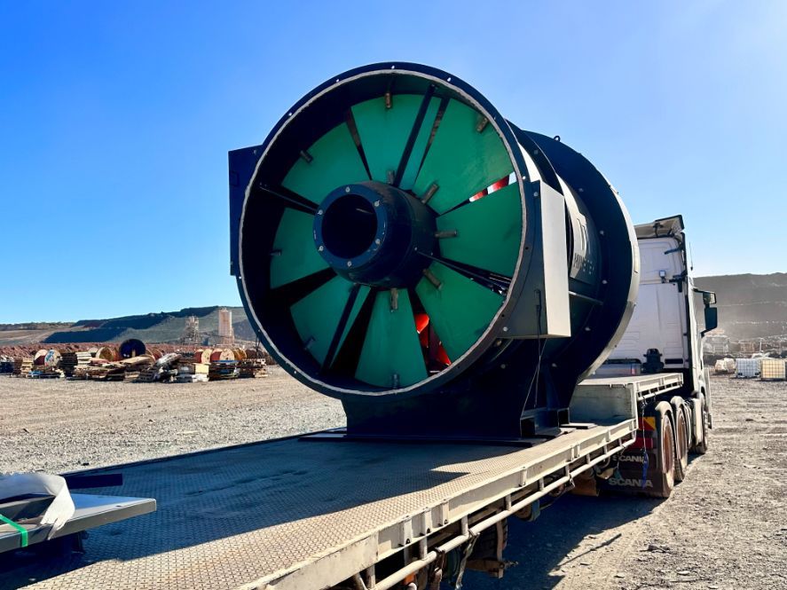 A Large Green Cylinder is Sitting on the Back of a Semi Truck — Goulburn Transport In Goulburn, NSW