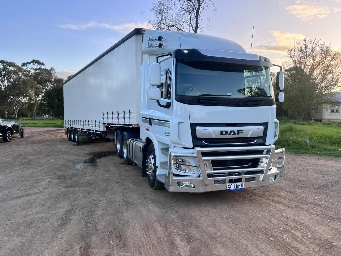 A White Truck Parked on Dirt — Goulburn Transport In Goulburn, NSW
