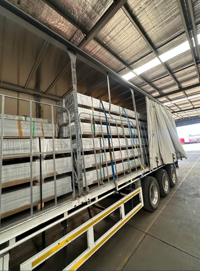 A Truck is Loaded With a Lot of Boxes in a Warehouse — Goulburn Transport In Goulburn, NSW