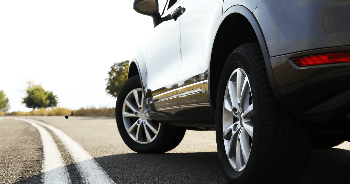 a used car purchase driving on the road