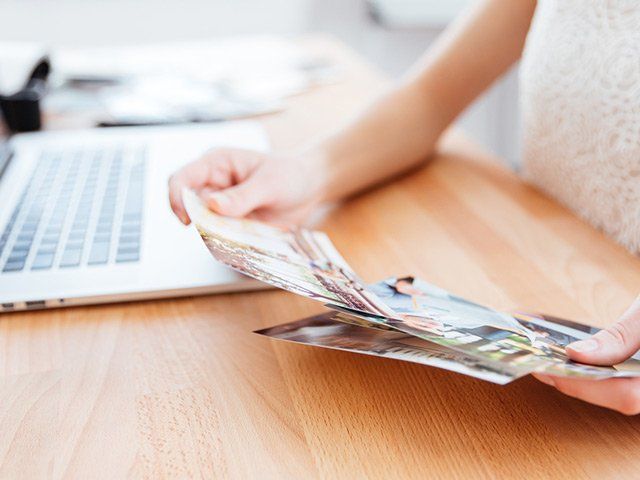 Photo printing image person holding prints