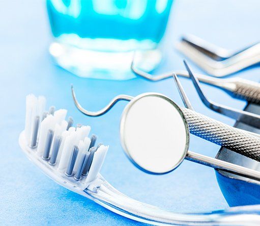 Dental tools and toothbrush — Dentists in York, PA