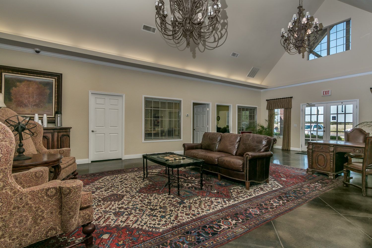 Silver Oak Apartments Sitting Area with Large Chandeliers