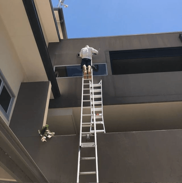 Plumber working on a roof in Brunswick Heads