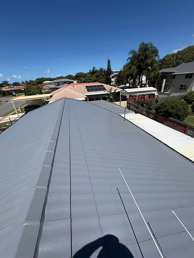 The Roof of a House with a Lot of Solar Panels on It — Boss Roof Tiling and Restoration in Sunshine Coast, QLD
