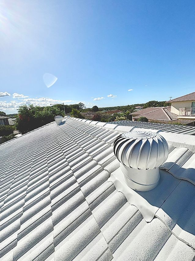 A Roof with a Ventilation Fan on Top of It — Boss Roof Tiling and Restoration in Caboolture, QLD