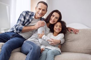 Family Sitting on the Sofa   — New York City, NY — Jaclyn M. Miller Attorney at Law