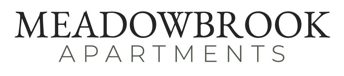 Meadowbrook Apartments logo. Text in a serif font.