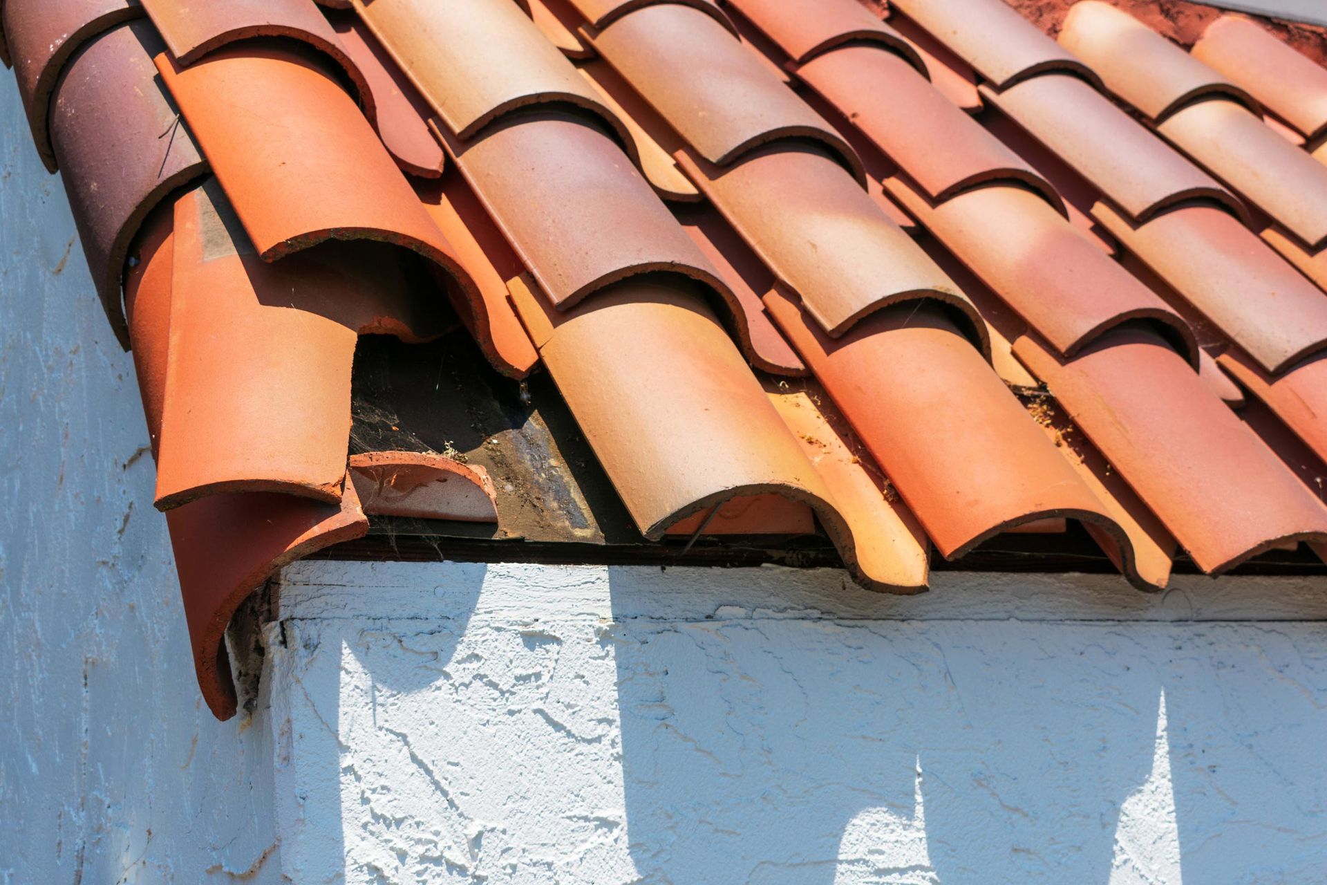 A close up of a tiled roof on a building