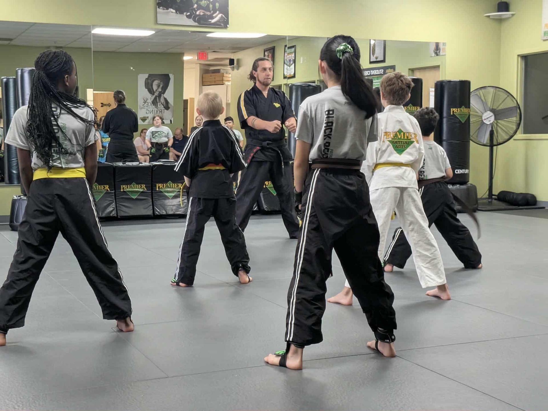 An aerial view of a city skyline at sunset.