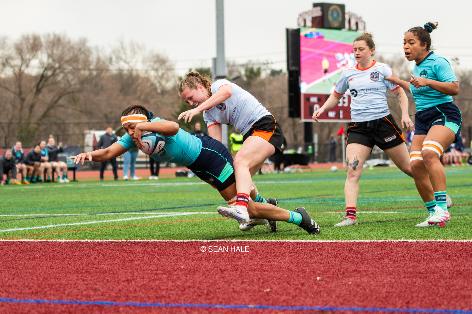 Two womens' rugby teams competing