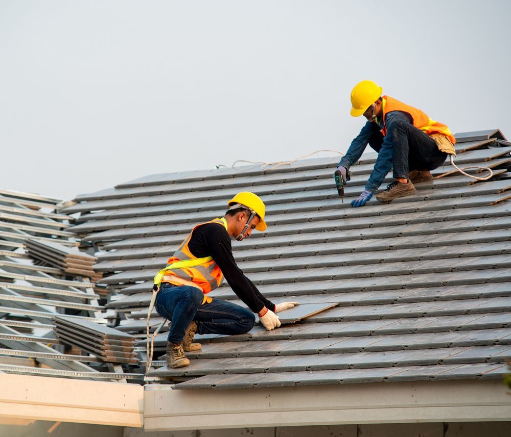 Professional Workers Installing New Roof