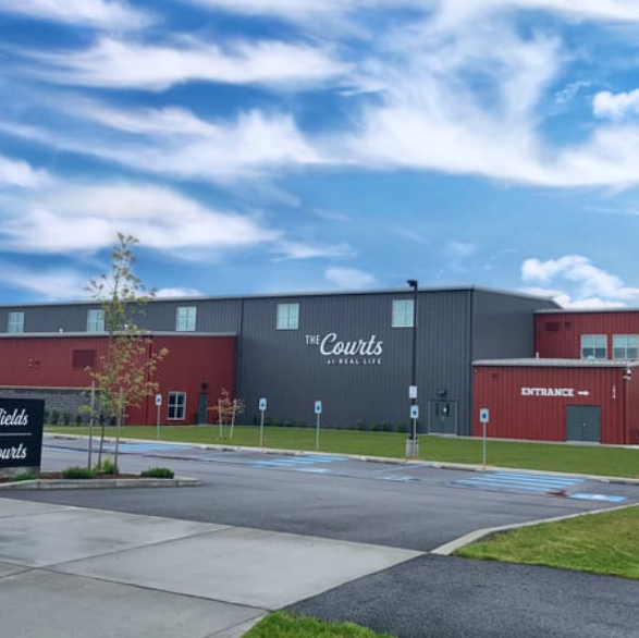 A large building with the words the courts on it