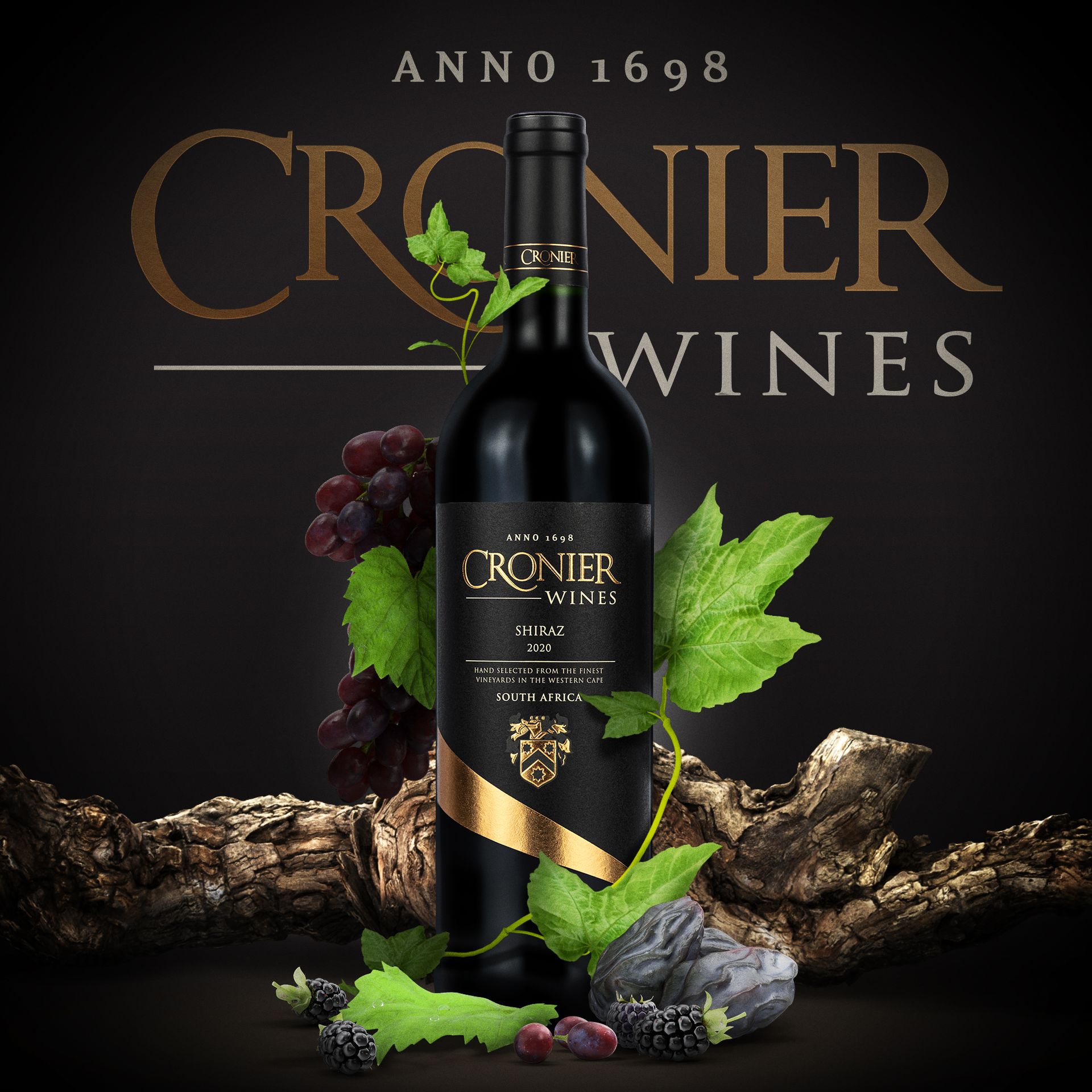 A bottle of cronier wines surrounded by grapes and leaves