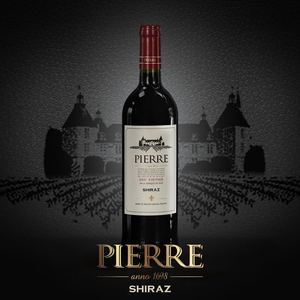 A bottle of pierre shiraz with a castle in the background
