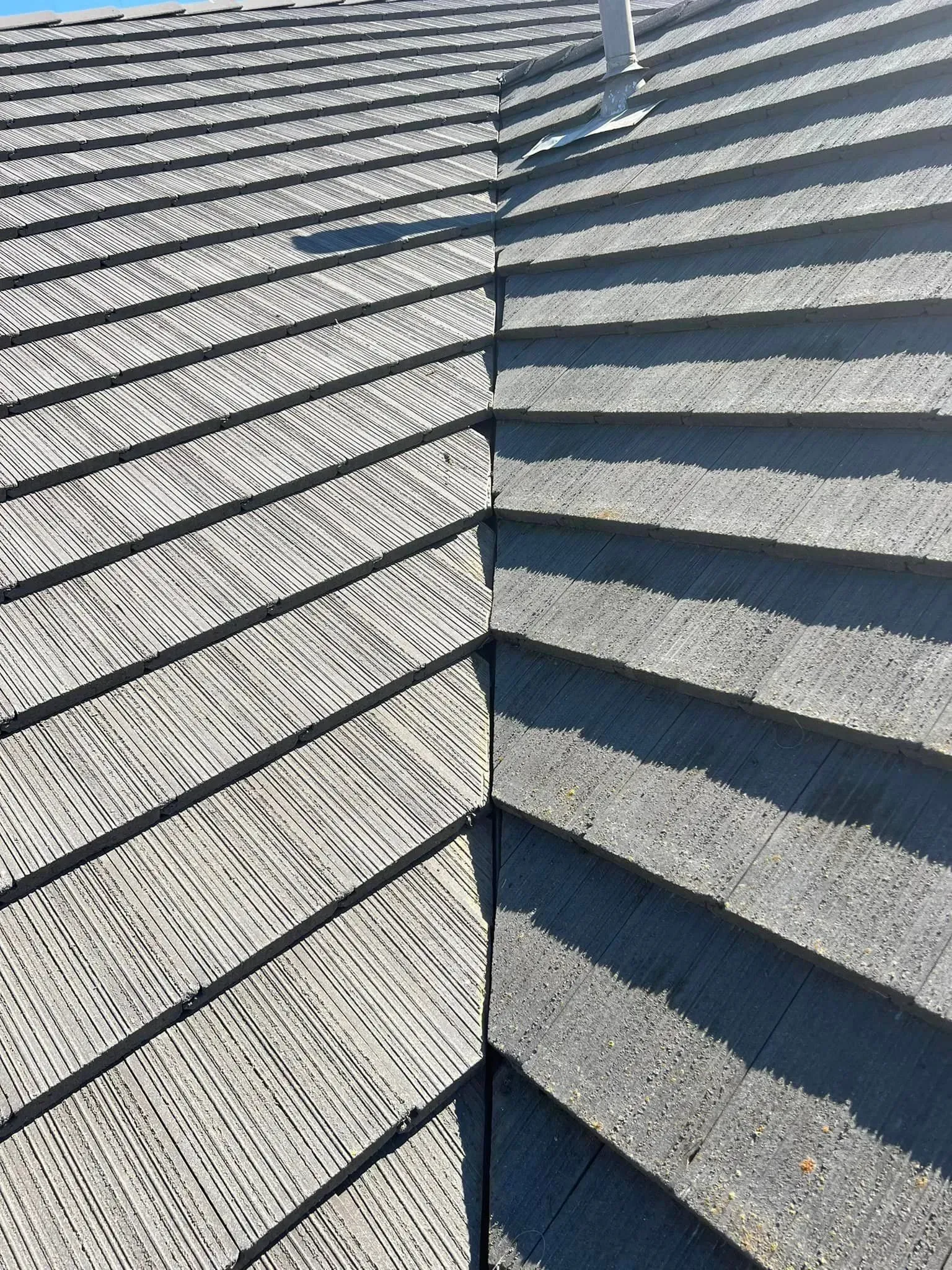 A close up of a roof with a diagonal pattern on it.