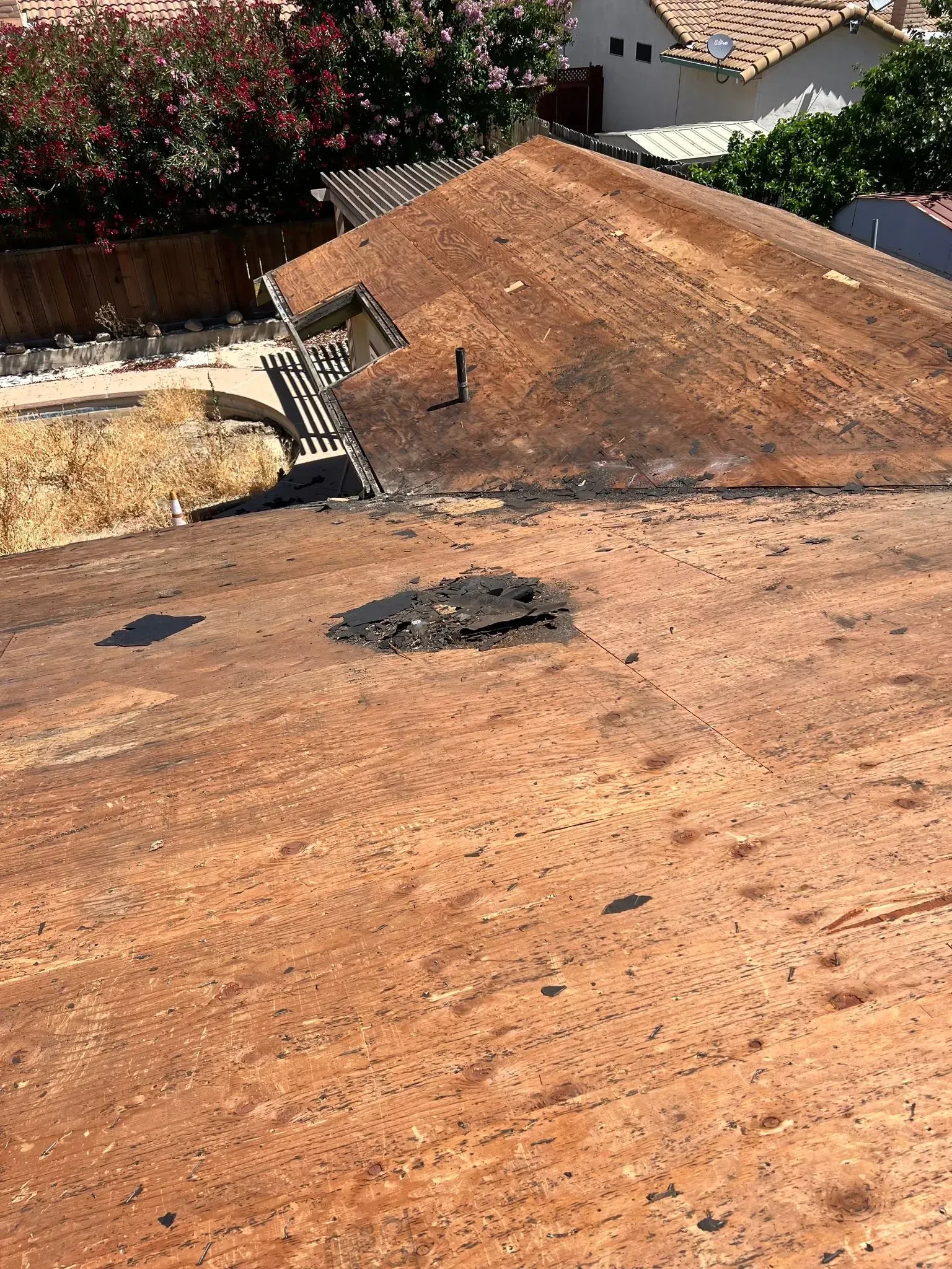 A close up of a roof with a hole in it.