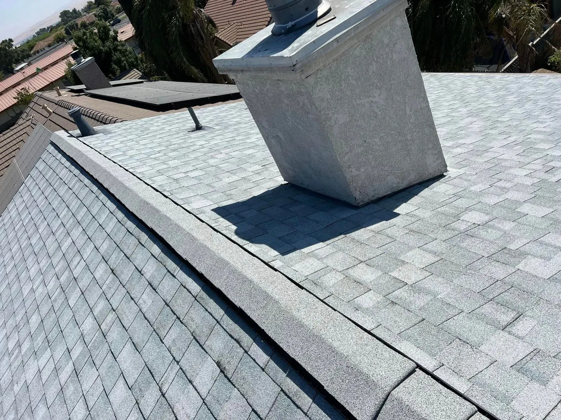 A roof with a chimney on top of it