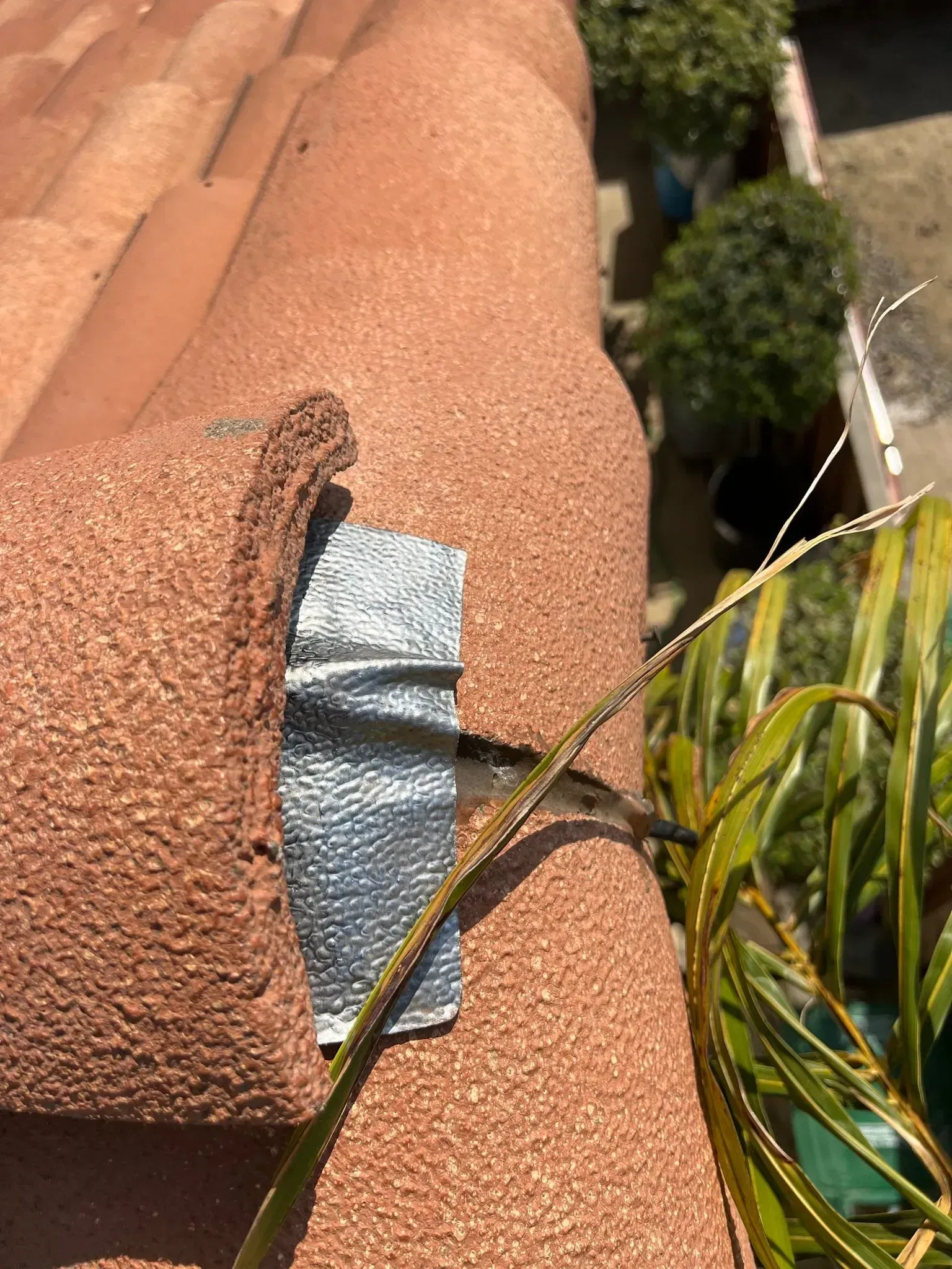 A close up of a roof with a piece of tape on it.