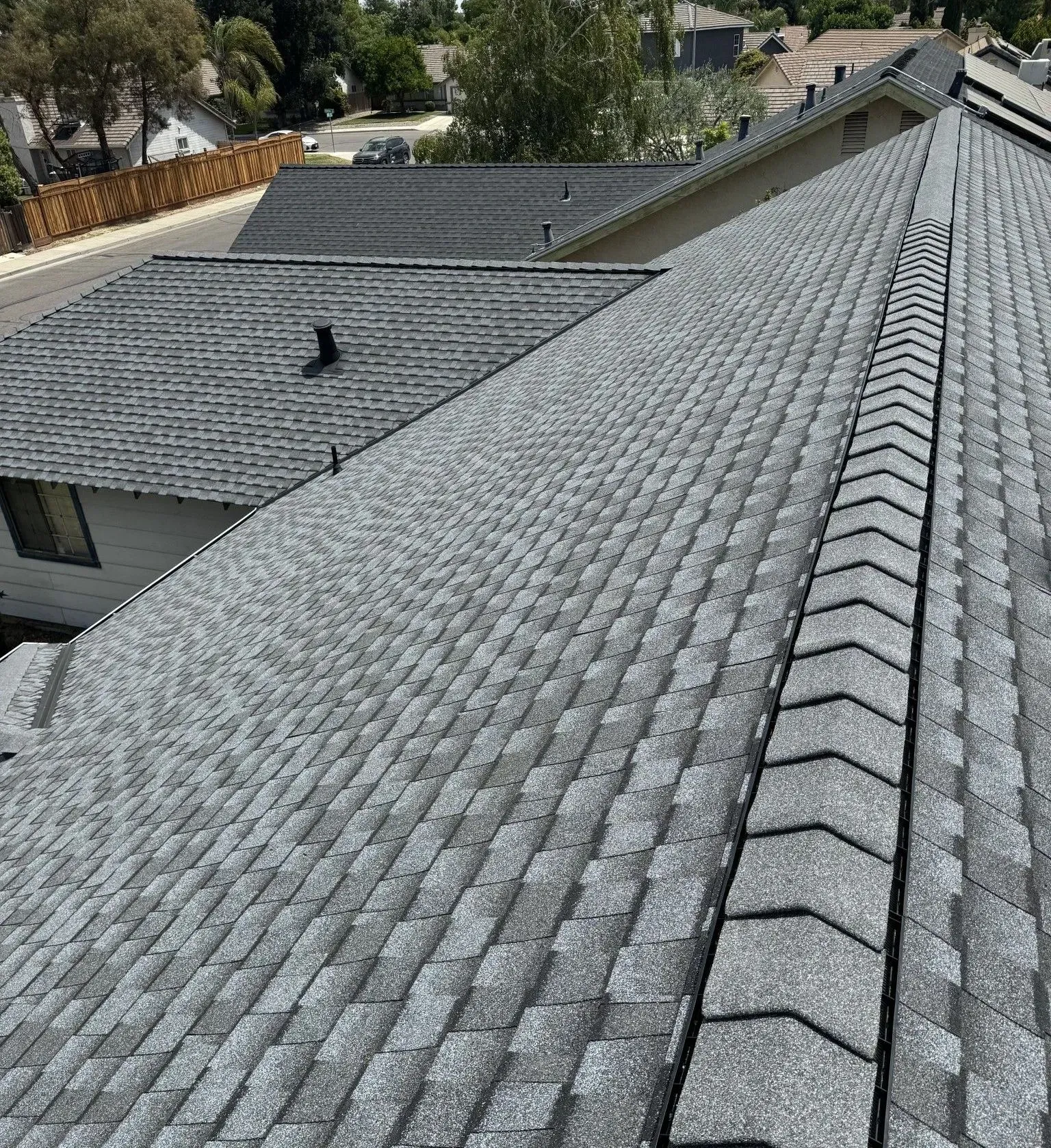 A close up of a roof with a lot of tiles on it.