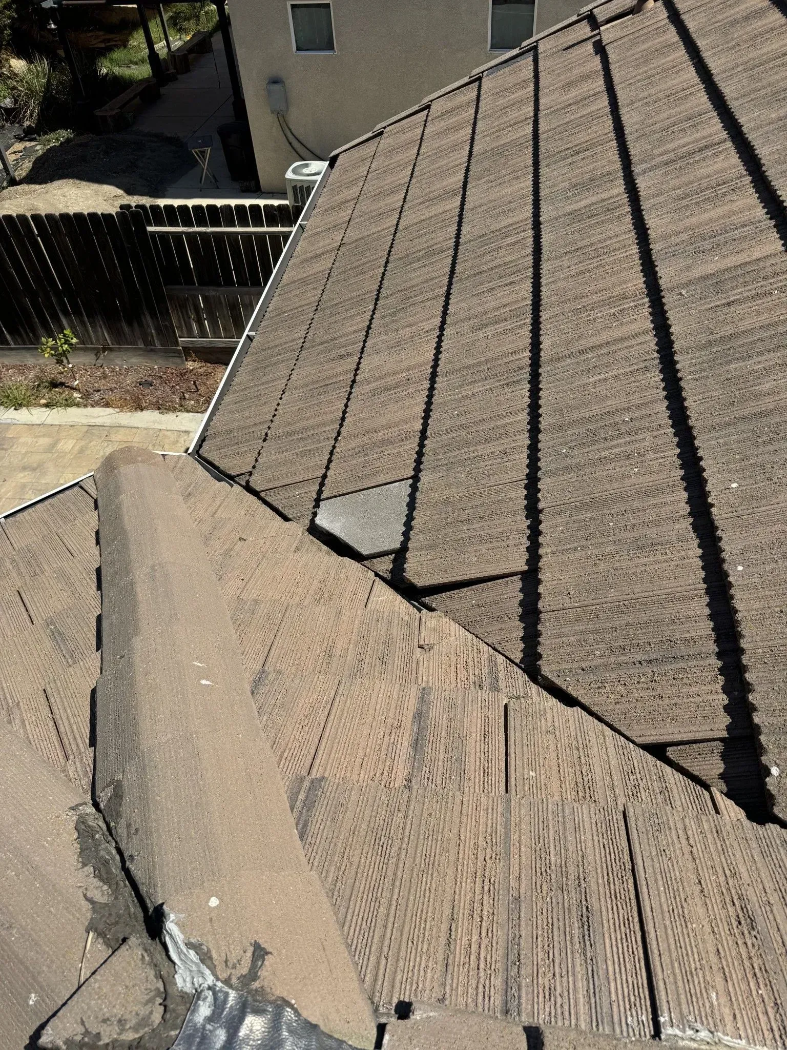 A close up of a roof with a hole in it.