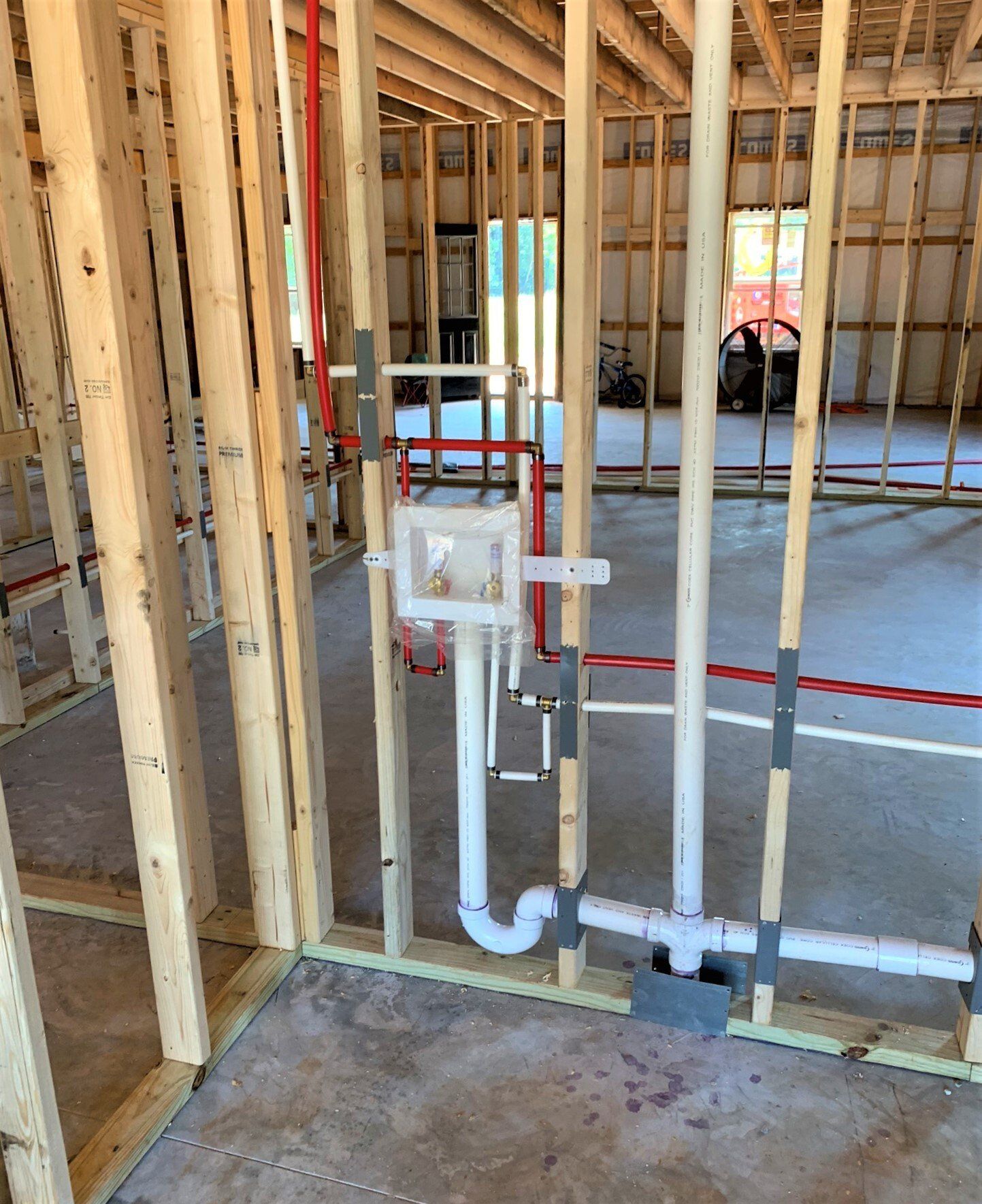 A room with a lot of pipes going through it