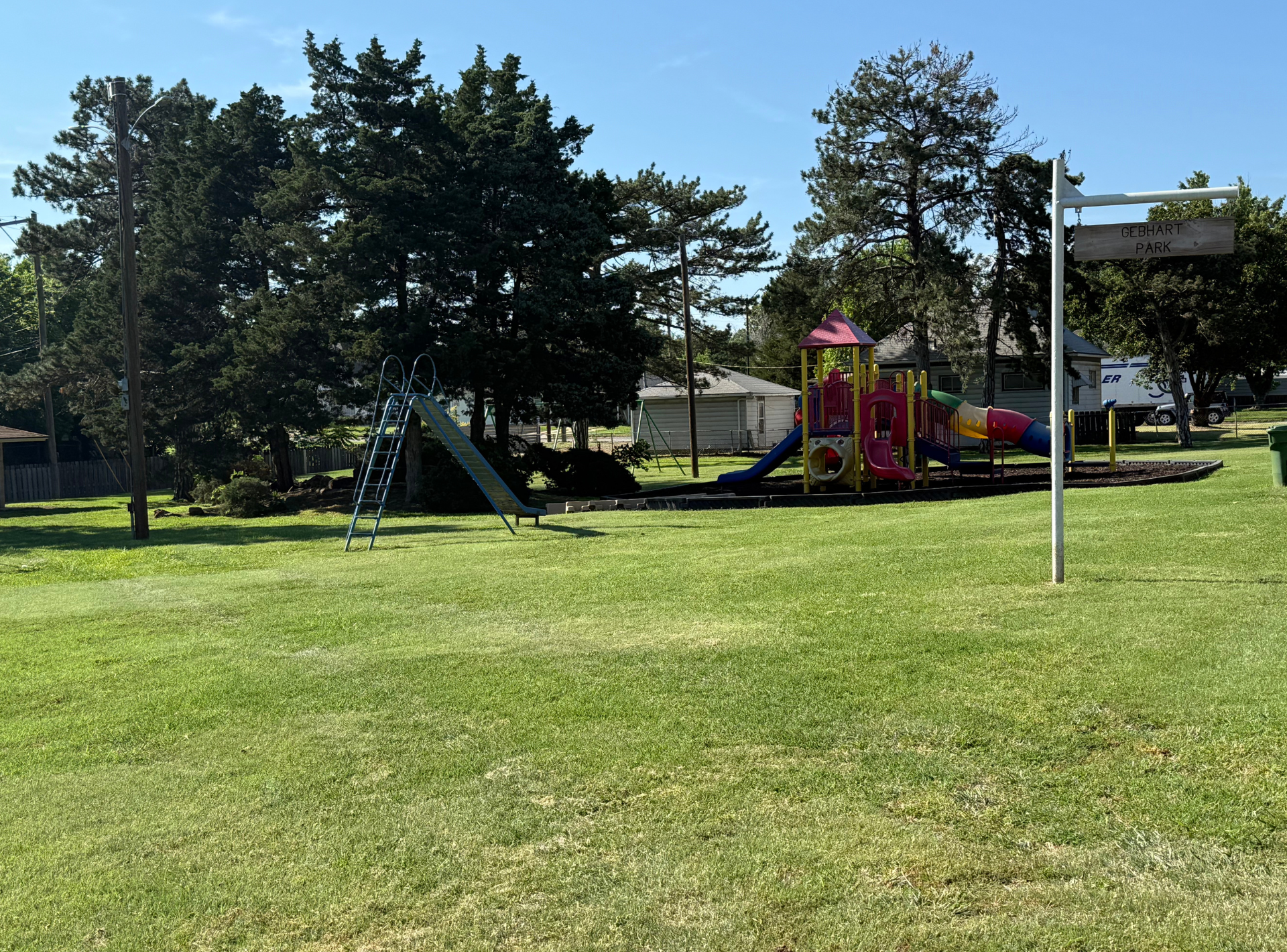 A park with a playground in the middle of it