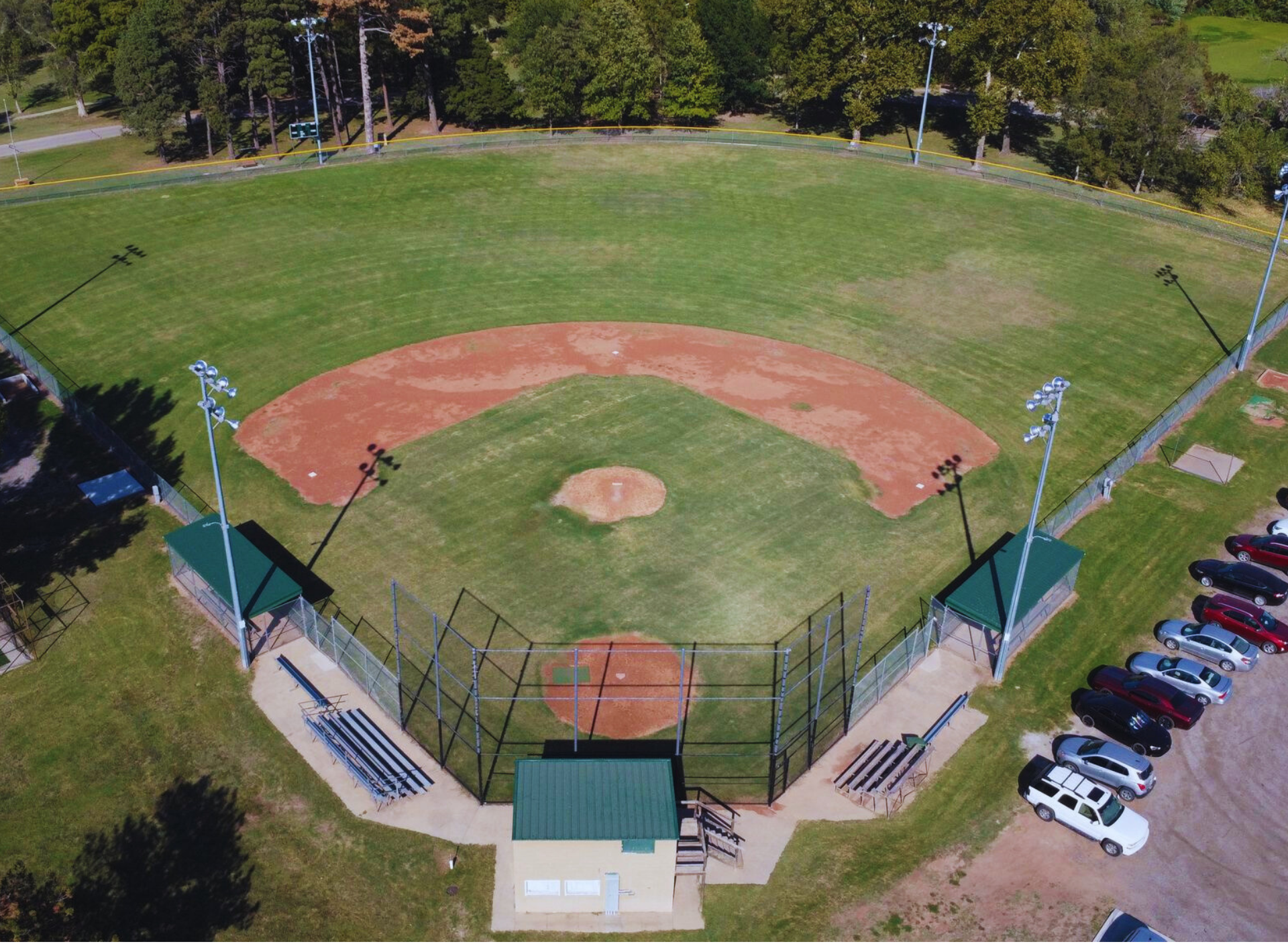 An aerial view of a baseball field in a park