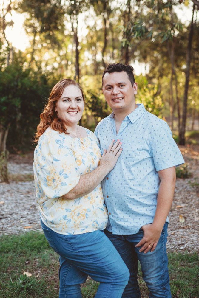 A Man and A Woman Are Posing for A Picture in The Woods — Tech Bias in Redbank Plains, QLD
