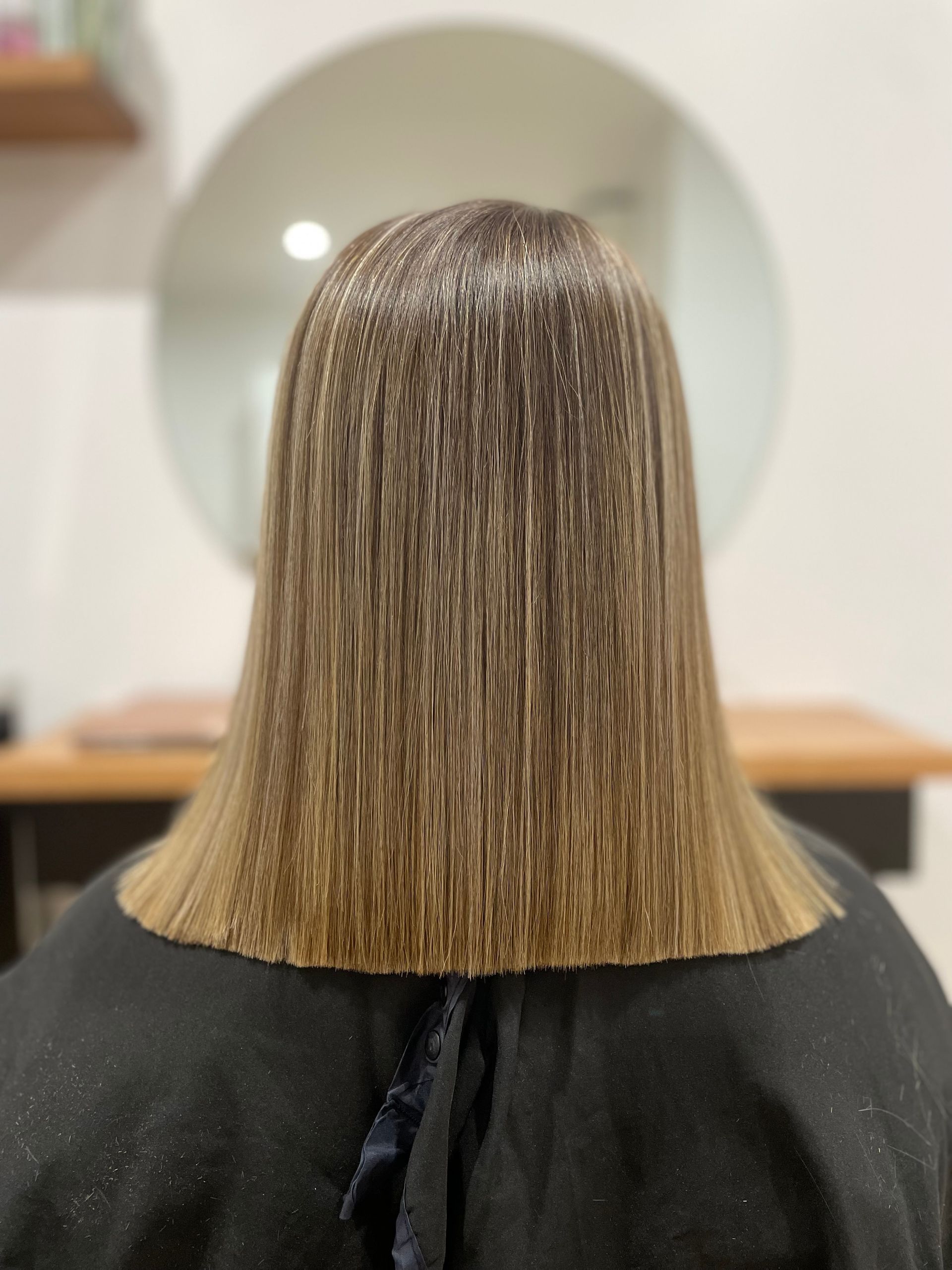 Blonde curly hair - Clippers Hair Salon Taree