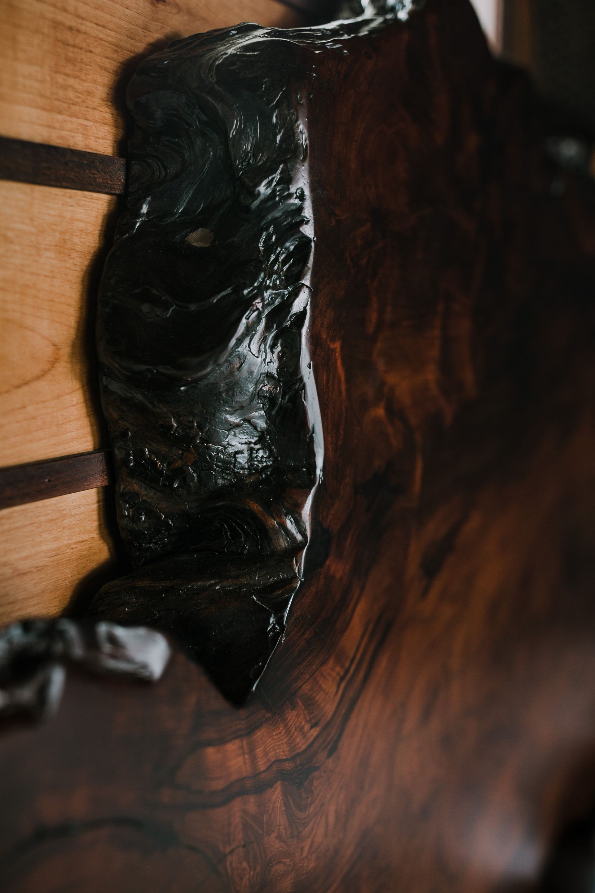 A close up of a piece of wood on a table.