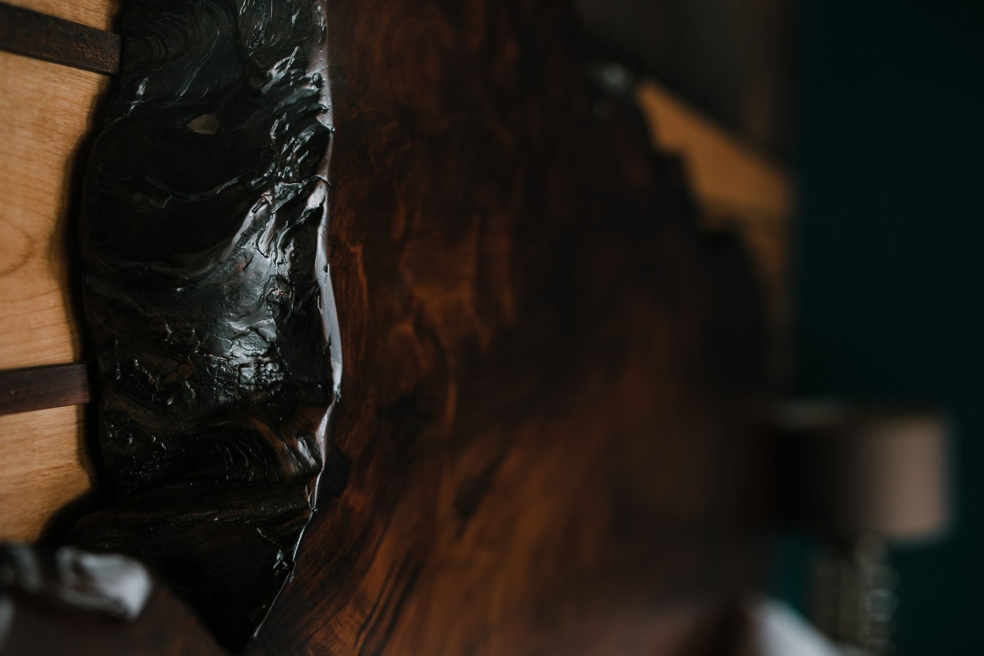 A close up of a piece of wood on a table.