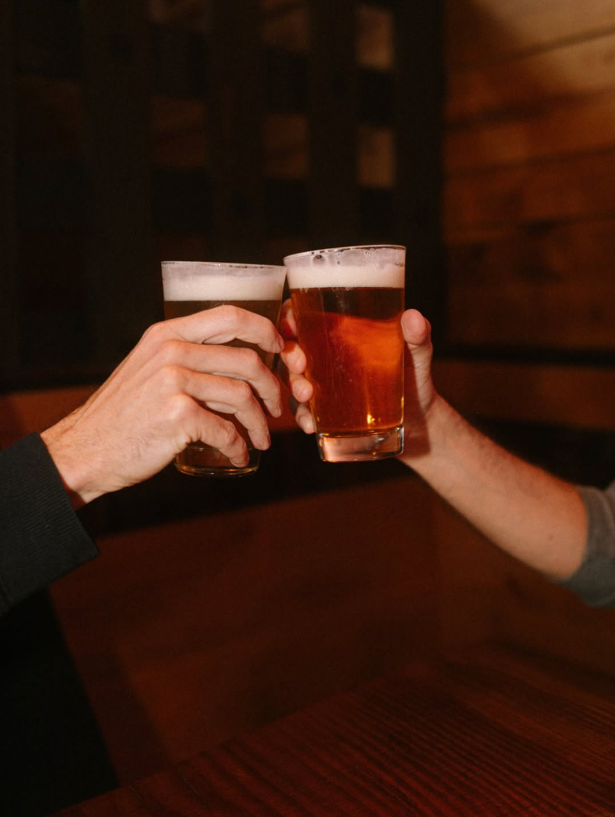 A group of people are toasting with champagne glasses at a party.