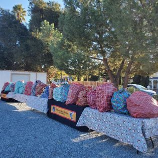 Bags of toys being picked up
