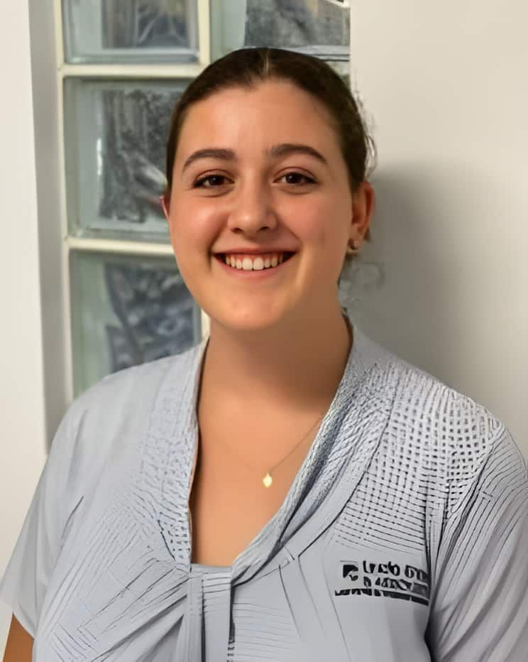 A woman wearing a shirt that says trade on it — Linda Emery & Associates In Gosford, NSW