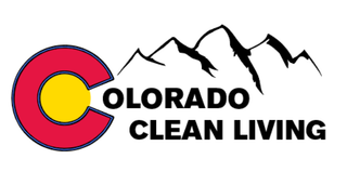 A logo for colorado clean living with mountains in the background.