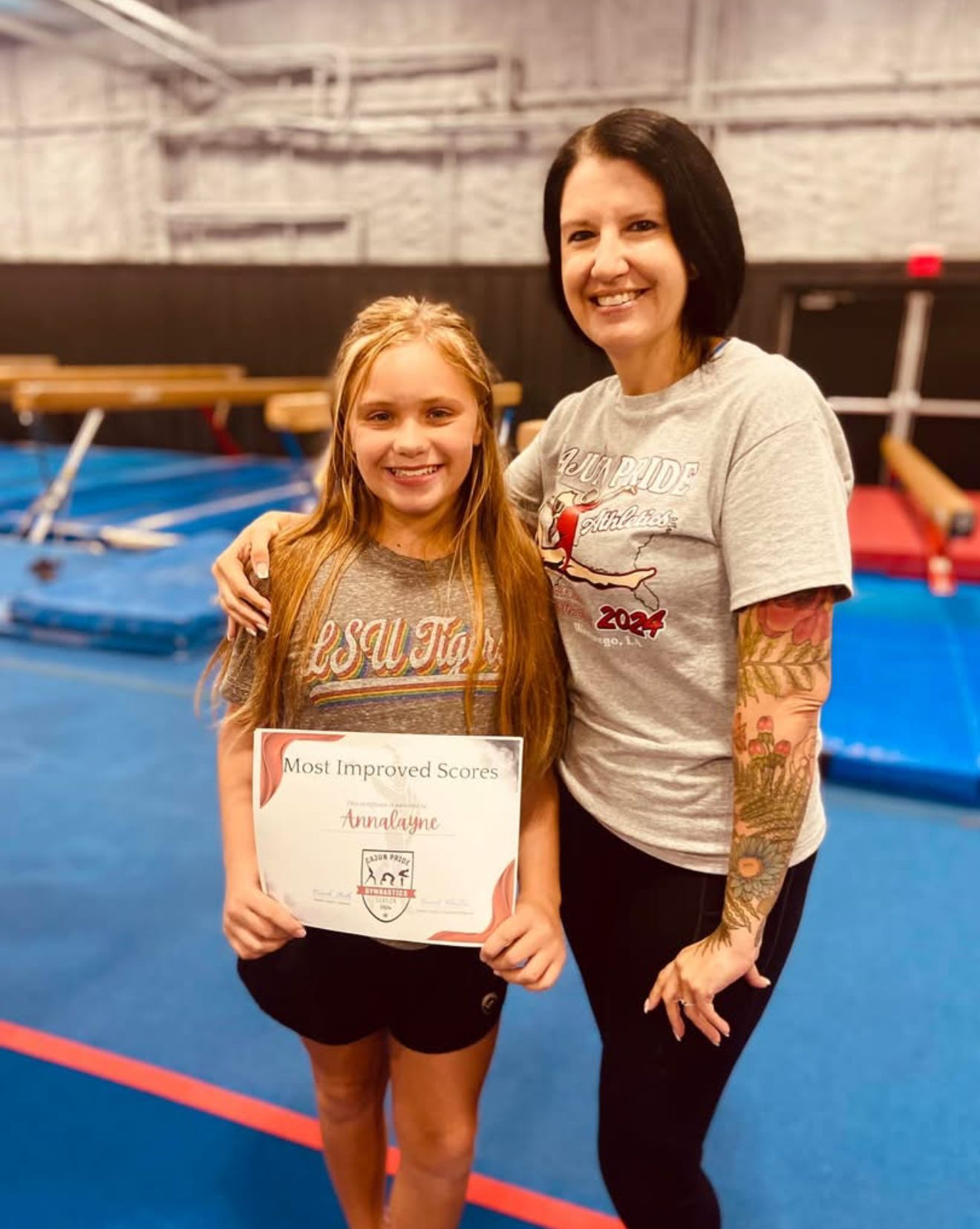 A woman is taking a selfie with a little girl